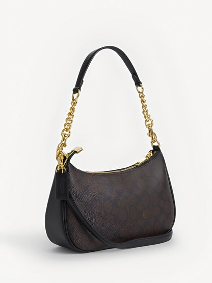 TERI SHOULDER BAG IN SIGNATURE CANVAS