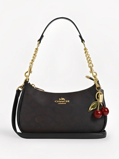 TERI SHOULDER BAG IN SIGNATURE CANVAS